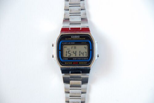 A photo of a slightly scratched Casio A164W stainless steel wristwatch